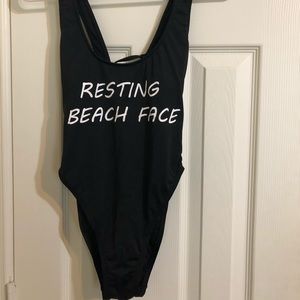 Black one piece high leg swimsuit